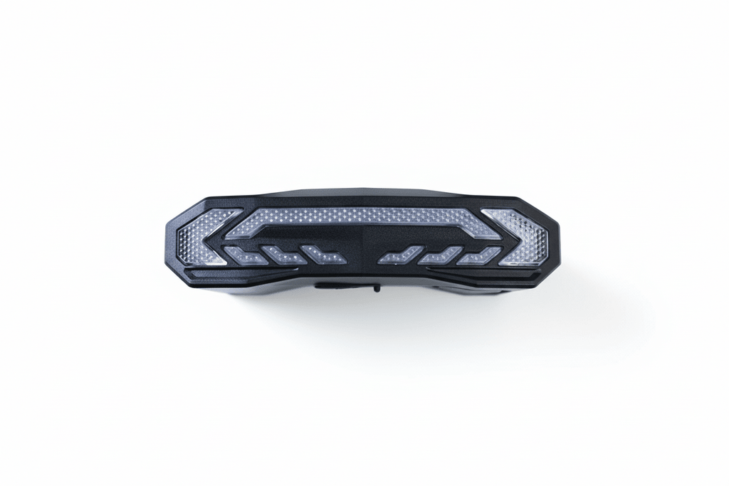 Black OPlace brake-sensing alarm bike tail light isolated on white