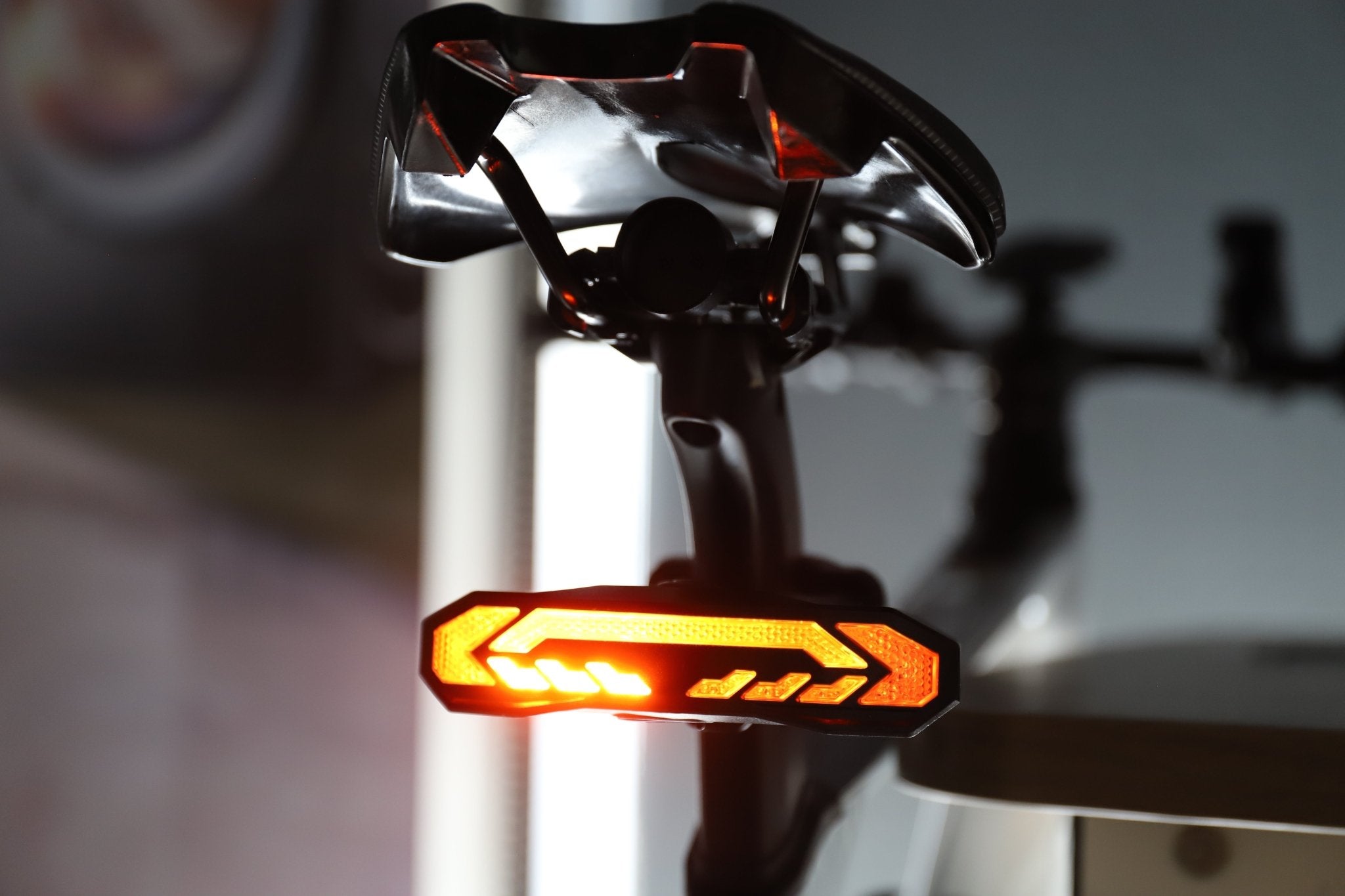 Amber brake-light pattern on OPlace tail light mounted under a saddle
